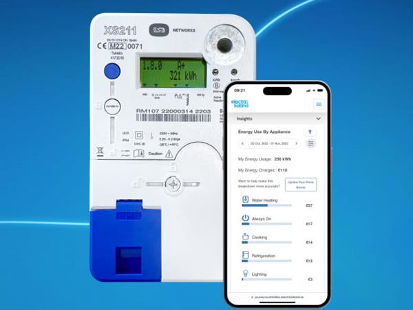 A smart meter and a mobile device showing energy consumption