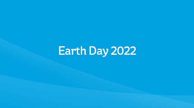 Earth Day in white text on blue background
